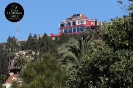 View of the Villa Bandama golf hotel sitting up high.