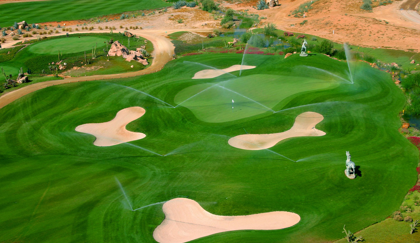 Desert Springs golf course green being watered