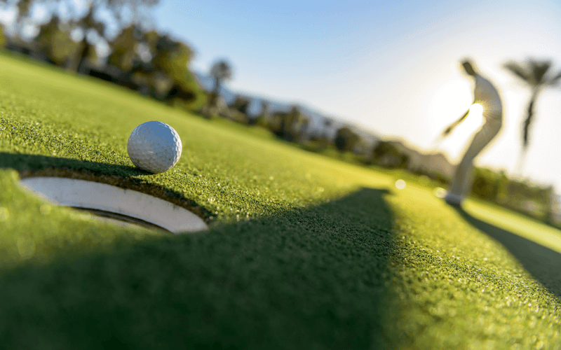 Golfer playing in the sun